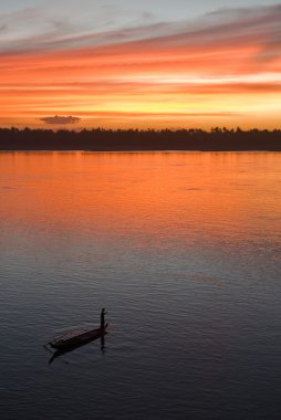 Sunset over Mekong river clipart