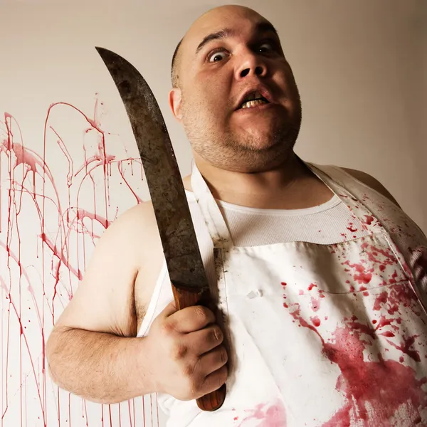 Mad butcher med kniv — Stockfoto