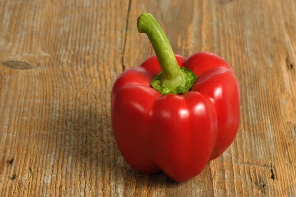 Red pepper on wood — Stock Photo, Image