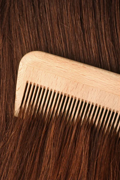 Peinar el cabello — Foto de Stock