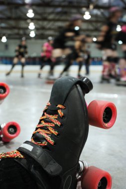 Roller derby skater knocked out clipart