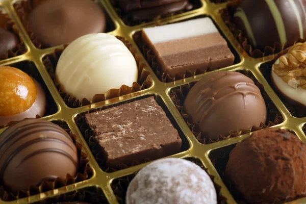 Chocolates em uma caixa — Fotografia de Stock