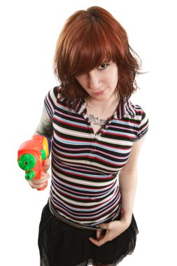 Pretty girl pointing squirt gun clipart