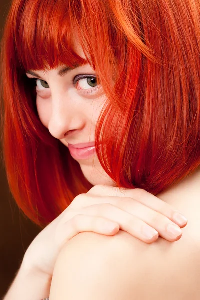 Beauttiful žena s červenými vlasy — Stock fotografie
