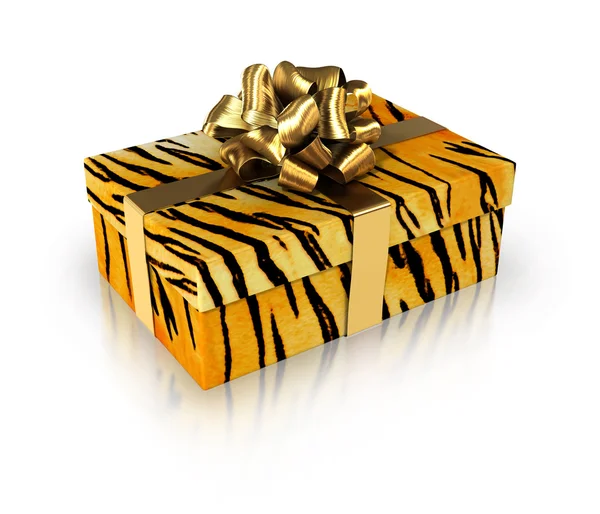 Gift tiger with golden ribbon — Stock Photo, Image