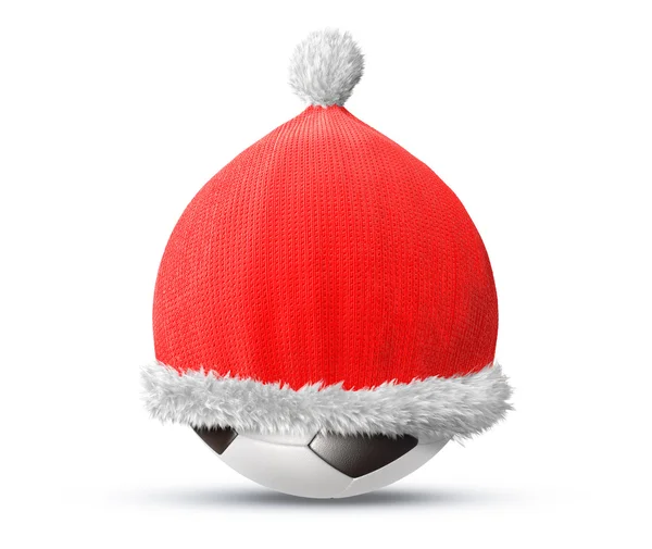 Санта шляпа на футбольном мяче — стоковое фото