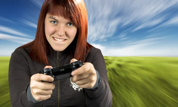 stock image Girl playing video game console