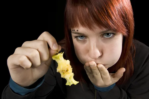 Girl full after eeating a delicious apple — Stock Photo, Image