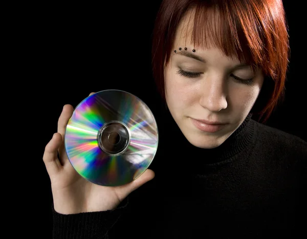 Bir kompakt disk tutan kız — Stok fotoğraf