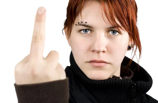 Chica enojada mostrando el dedo medio — Foto de Stock