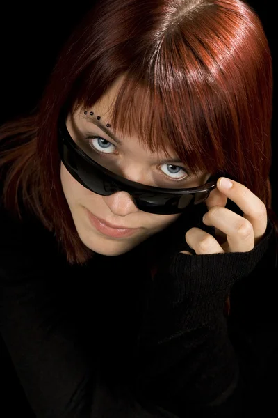 Girl looking through sunglasses. — Stock Photo, Image