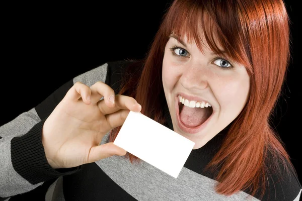 Cute redhead holding blank business card — Stock Photo, Image