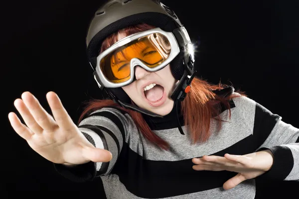 Chica usando un casco de esquí y googles Fotos de stock libres de derechos