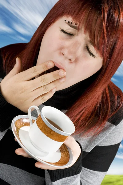 Girl tired preparing to drink coffee