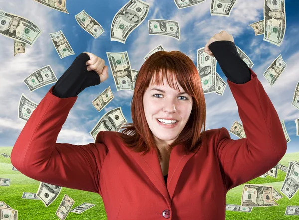 Pige juble en sejr med dollars falder fra t - Stock-foto