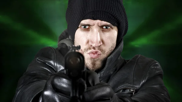 stock image Undercover agent firing gun in the camera