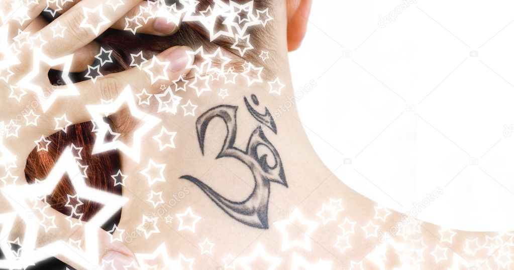 Close-up of a ohm tattoo