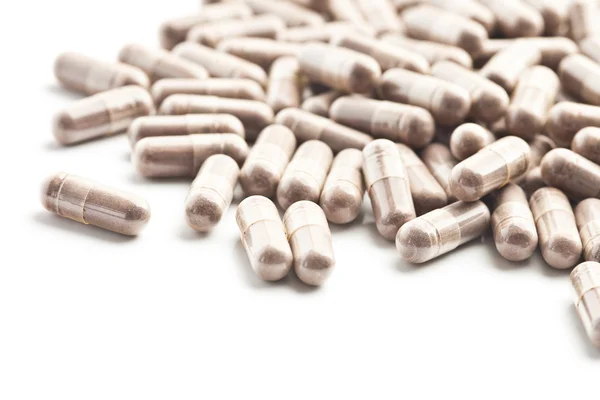 Pillole medicinali versate dal barattolo — Foto Stock