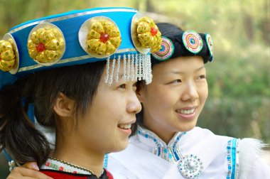 Two Chinese women in traditional clothes clipart