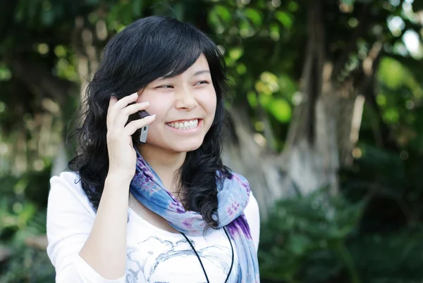 stock image Woman talking on a mobile phone