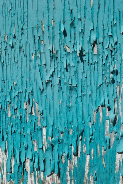 stock image Pale blue peeling paint on a wooden wall