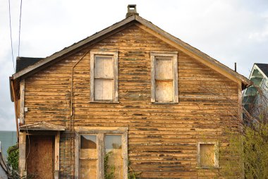 Abandoned building with peeling paint clipart