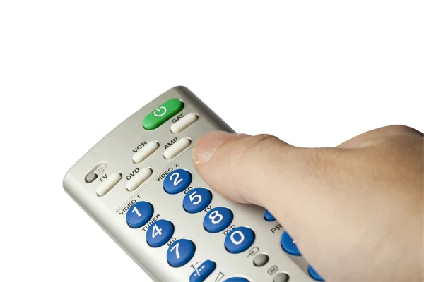 Рука тримає пульт дистанційного керування телевізором — стокове фото