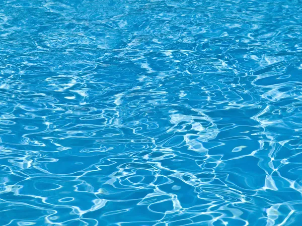Piscina azul fundo de água — Fotografia de Stock