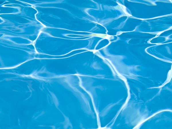 Piscina azul fundo de água — Fotografia de Stock