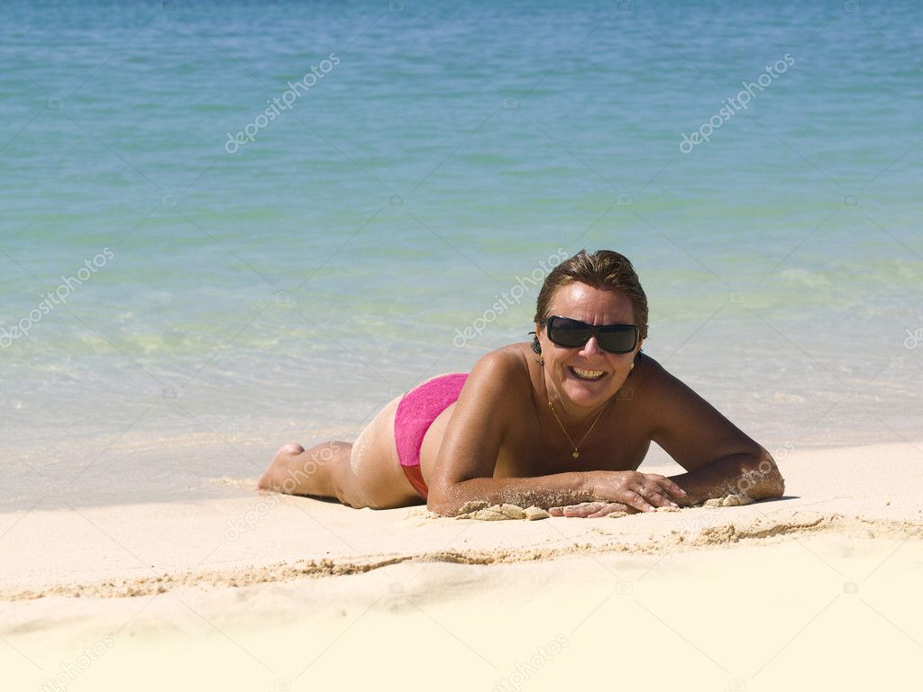 Mature Woman in the Beach — Stock Photo © SOMATUSCANI #3191158