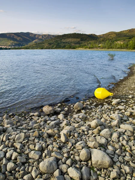 Yellow Buoy in the Lake Sant Antoni — Stock Photo, Image