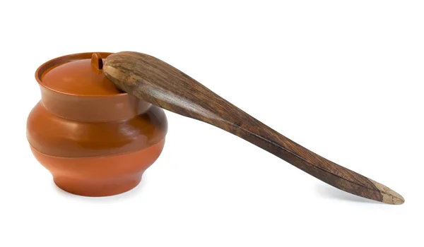 Pot and wooden spoon — Stock Photo, Image