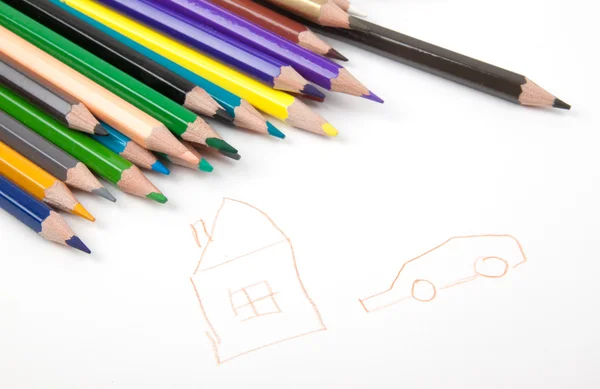 Цветные карандаши с картинкой — стоковое фото