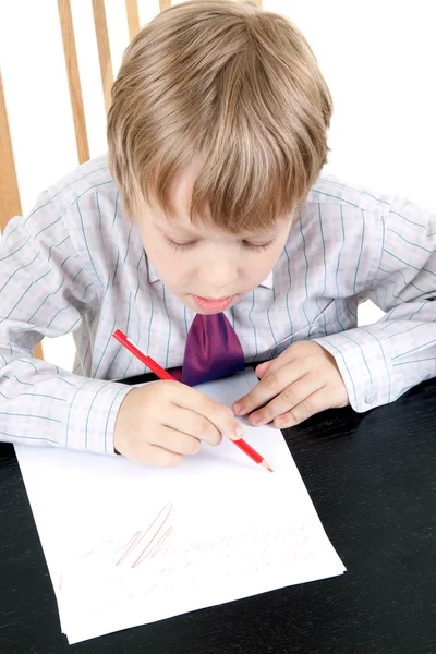 Chlapec kreslí — Stock fotografie