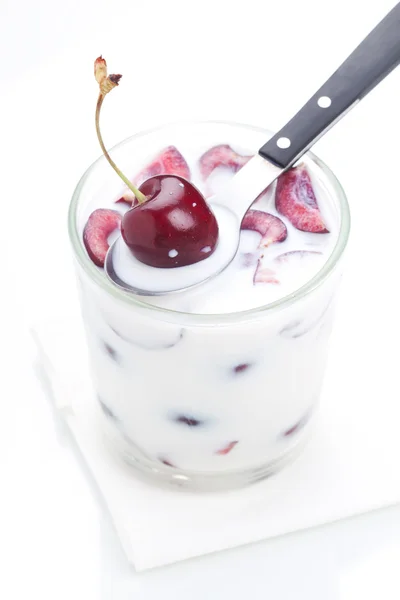 Milk with a cherry — Stock Photo, Image