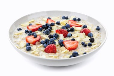Bowl of oatmeal with berries clipart