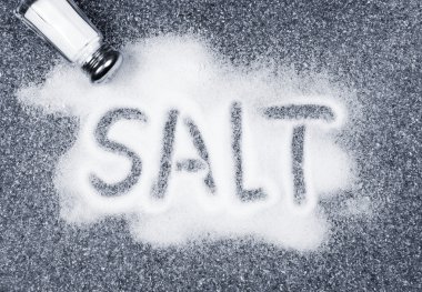 Salt spilled from shaker clipart