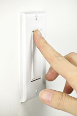 Turning off light switch clipart