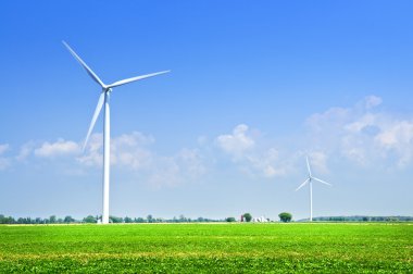 Wind turbines in field clipart