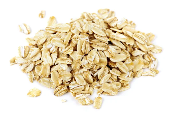 Pile of uncooked rolled oats — Stock Photo, Image