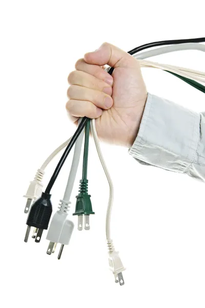 Mão segurando pacote de cabos de alimentação — Fotografia de Stock