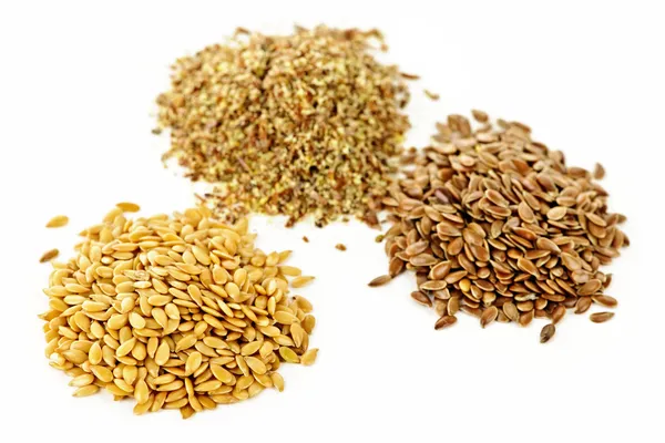 Brown, golden and ground flax seed — Stock Photo, Image