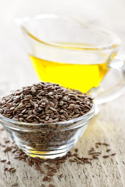 Brown flax seed and linseed oil — Stock Photo, Image