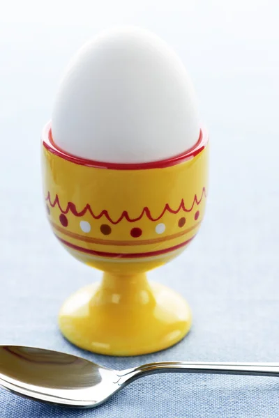 Boiled egg in cup — Stock Photo, Image