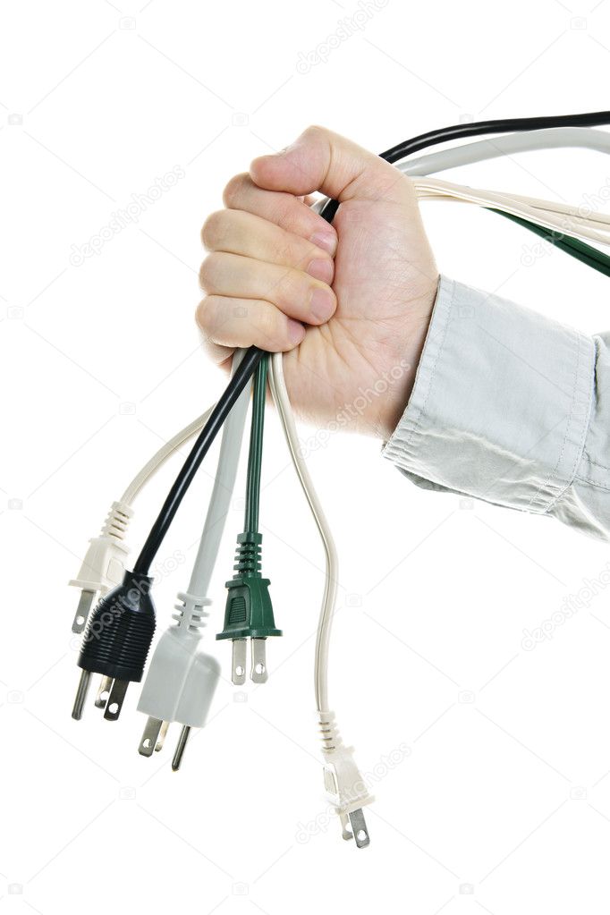 Hand holding bundle of power cables