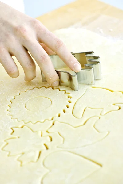 Cookie cutter and dough — Stock Photo, Image