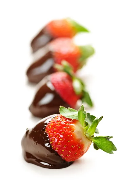 Strawberries dipped in chocolate — Stock Photo, Image