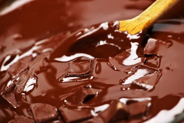 Derreter chocolate e colher — Fotografia de Stock