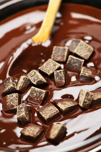 Tání čokolády a lžíce — Stock fotografie