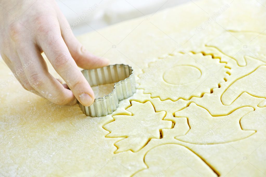 Cutting out cookies from dough